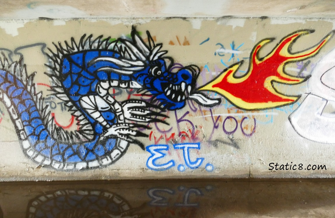 Graffiti by ET, blue, fire-breating dragon
