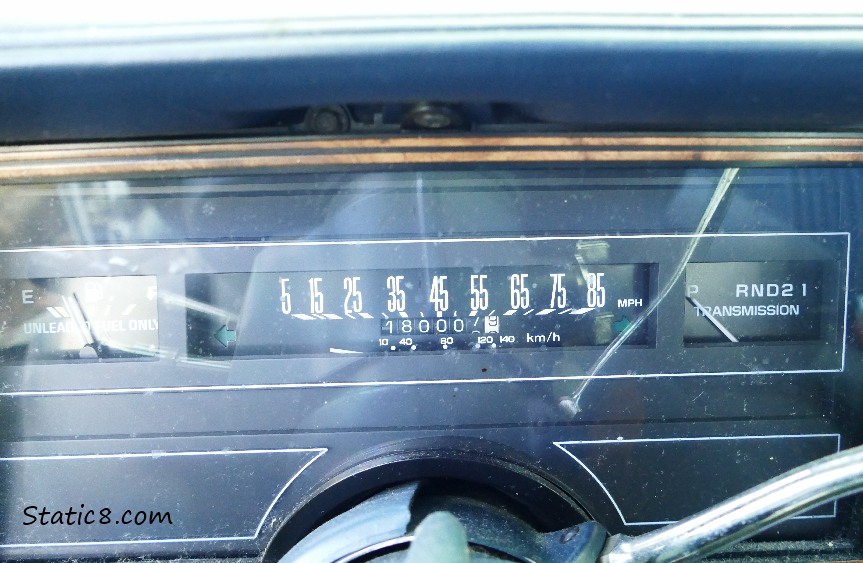 Picture of the dash of a car with 180,007.9 miles showing