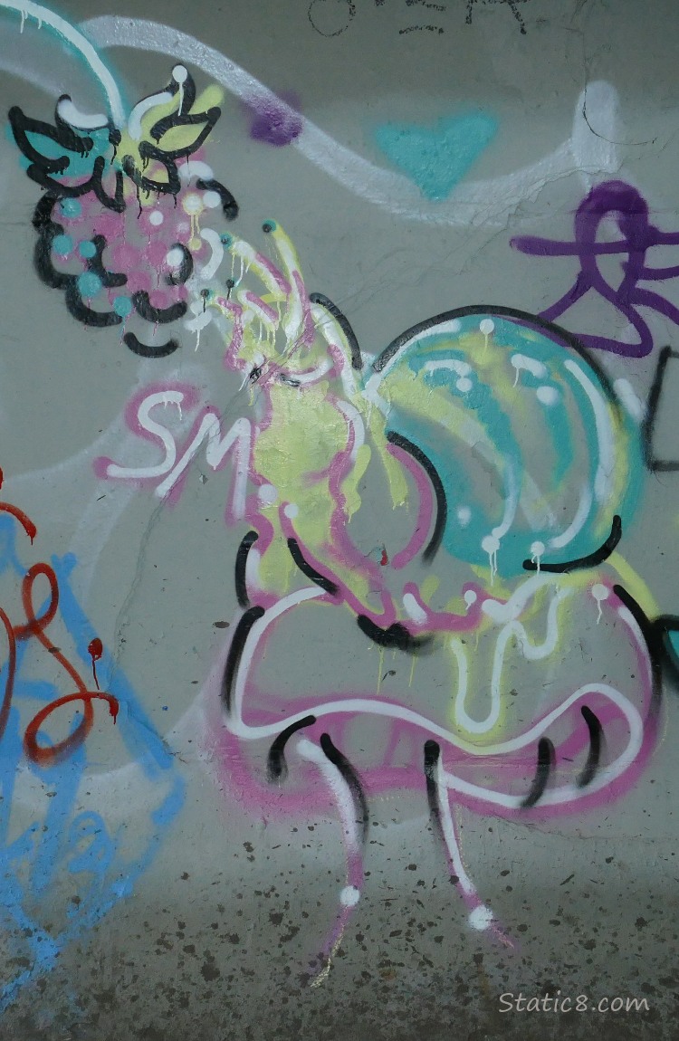 Graffiti of a snail on a mushroom