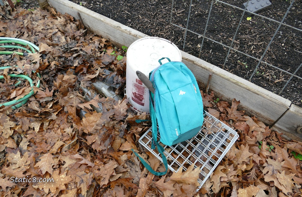 Backpack and upside down bucket