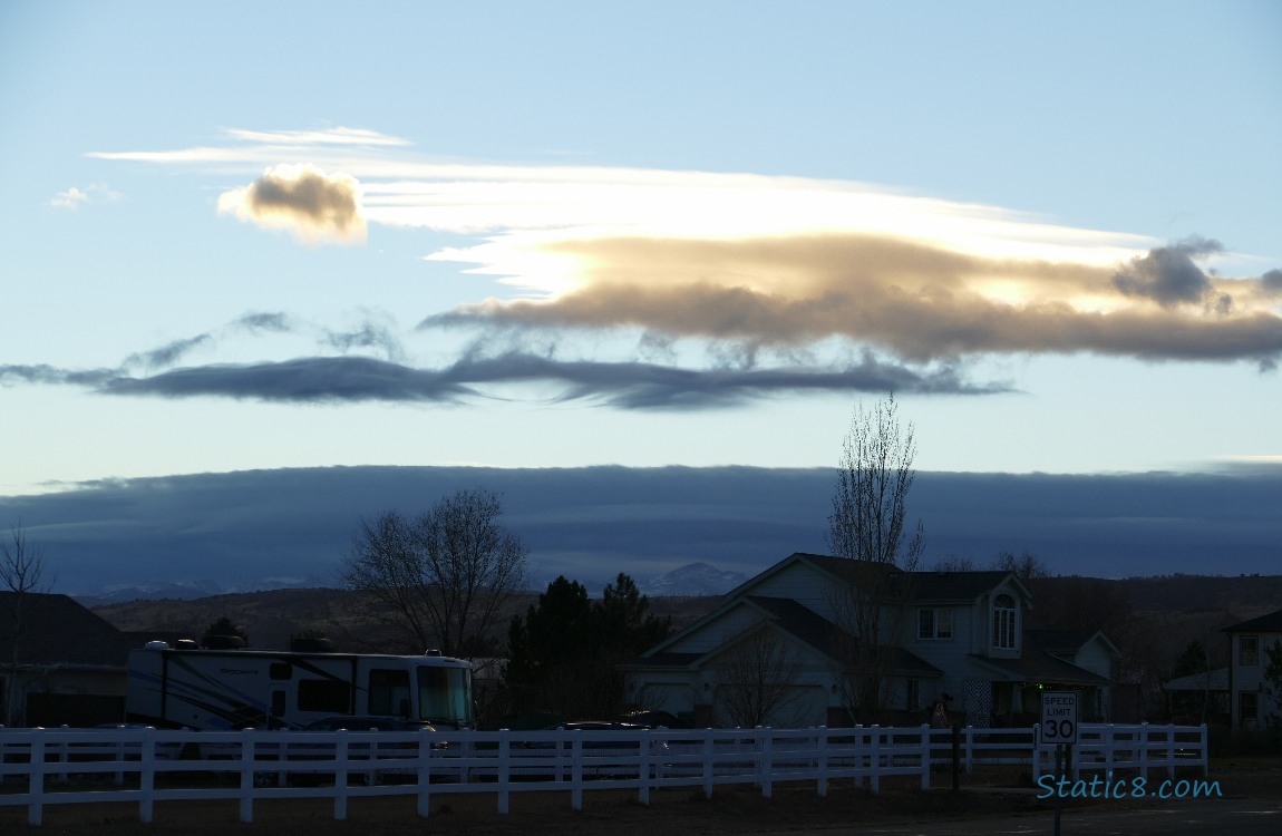 Bright sun lit clouds in a blue sky