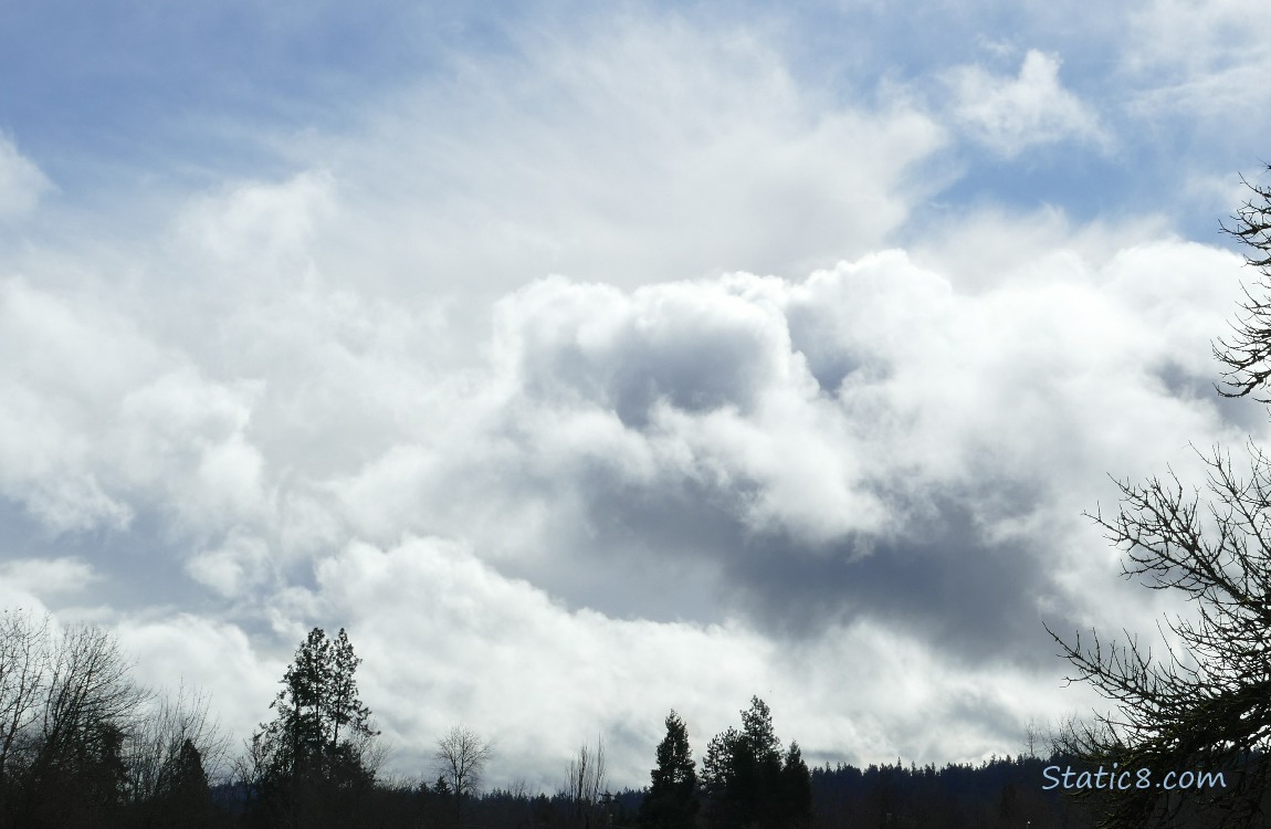 Clouds building in a blue sky