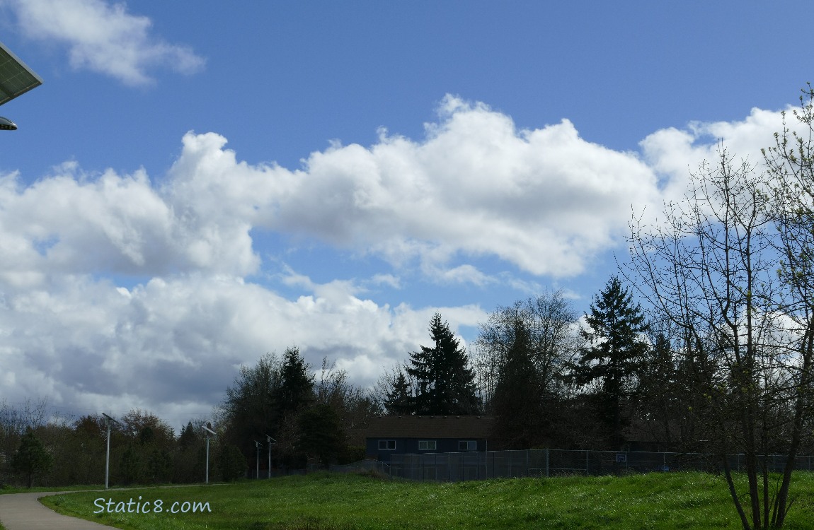 Clouds and blue sky over the bike path