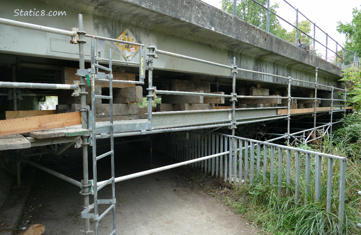 Construction under a bridge, blocking the path under it