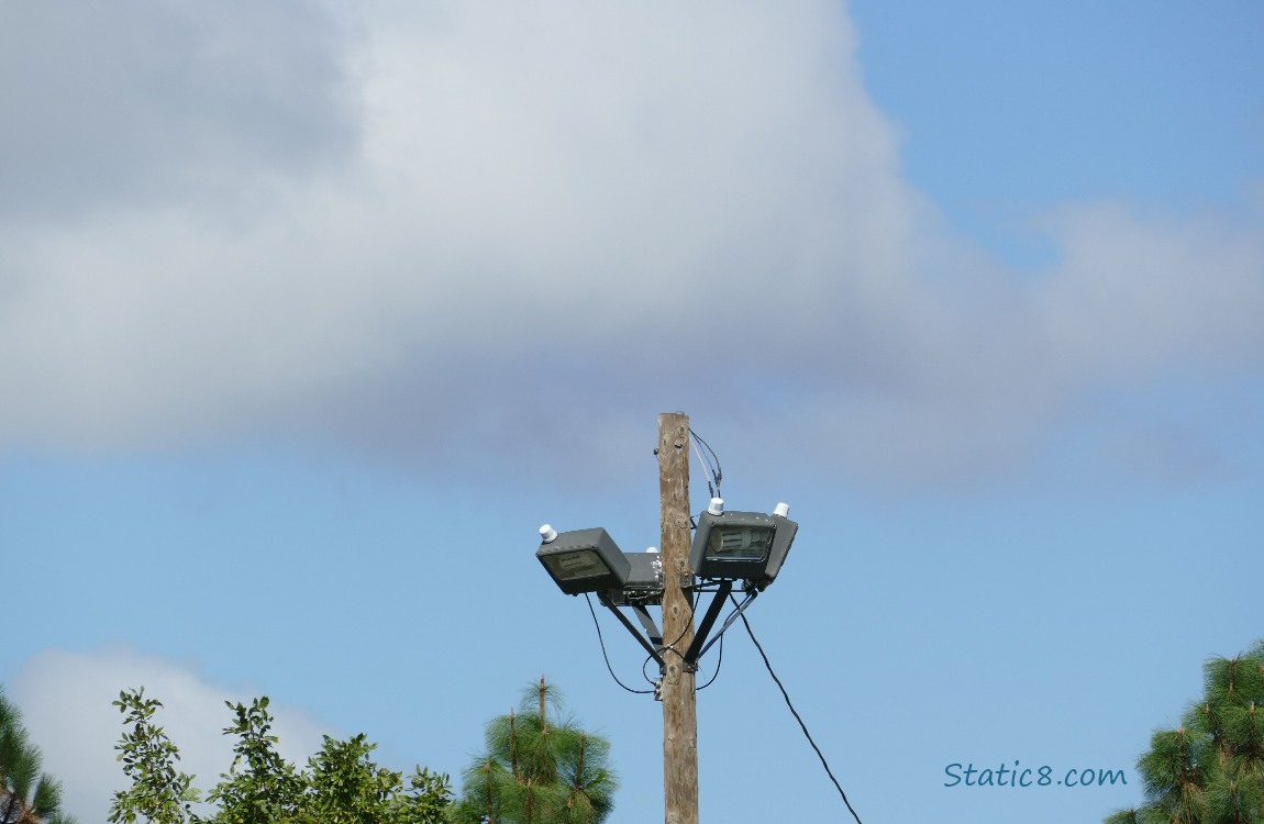 Empty pole, blue sky behind